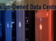 Modern data center servers with foreign ownership question at Open Agenda WTF event, highlighting global tech infrastructure and international investment issues.
